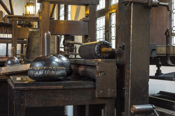 Print shop showing 18th and 17th century printing presses in the Plantin-Moretus Museum