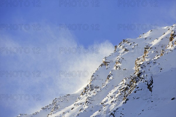 Snowstorm in the mountains in winter in the Gran Paradiso National Park