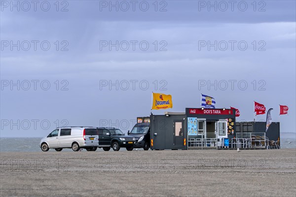 Dick's Taria fast food restaurant on a stormy day along the North Sea coast at the Brouwersdam