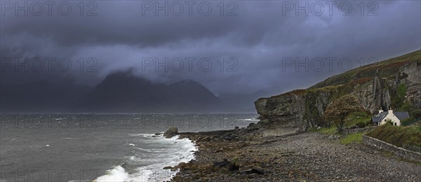 Rain clouds at sunset over the Cuillin Hills