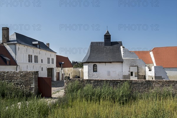 Courtyard showing chapel and gardener s house of the Chateau d'Hougoumont