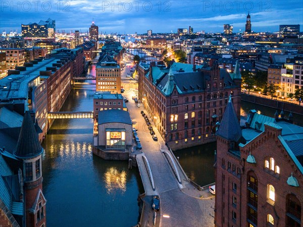 Aerial view of Speicherstadt Hamburg at Brooksfleet with Elbe Philharmonic Hall at blue hour