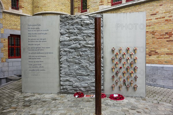 World War One execution pole and poem by Erwin Mortier at inner courtyard of the Poperinge town hall