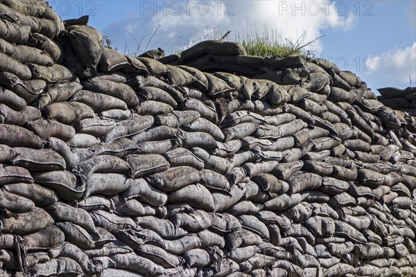 Wall of stacked sandbags in WWI trench used as defence in First World War One warfare