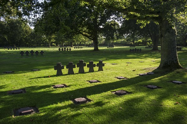 Tombstones and stone crosses at La Cambe German Second World War military cemetery