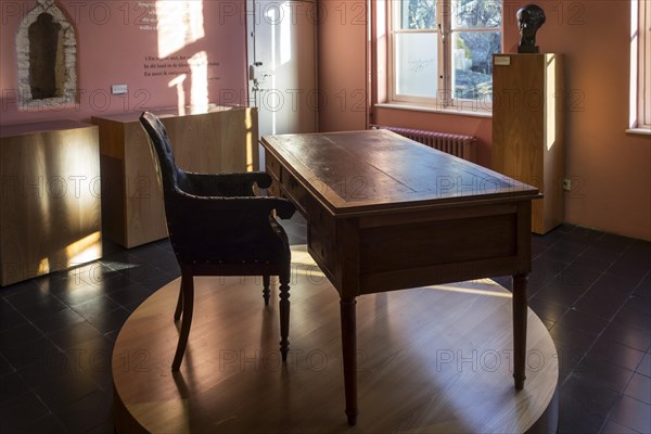 Chair and writing desk of the Flemish poet Guido Gezelle in the Gezellemuseum