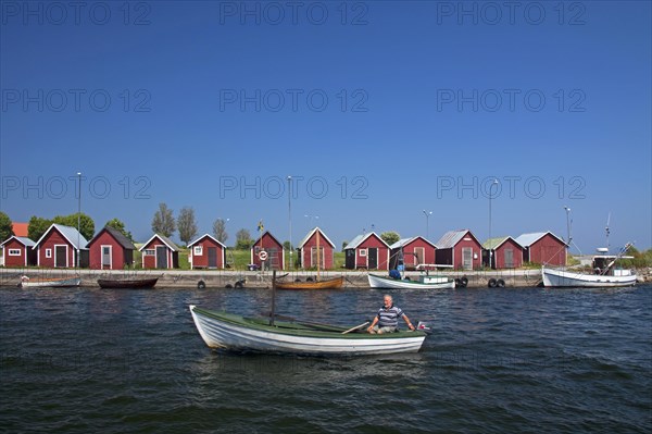 Fisherman in boat at the fishing village Kappelshamn