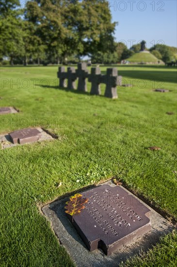 Tombstones and stone crosses at La Cambe German Second World War military cemetery