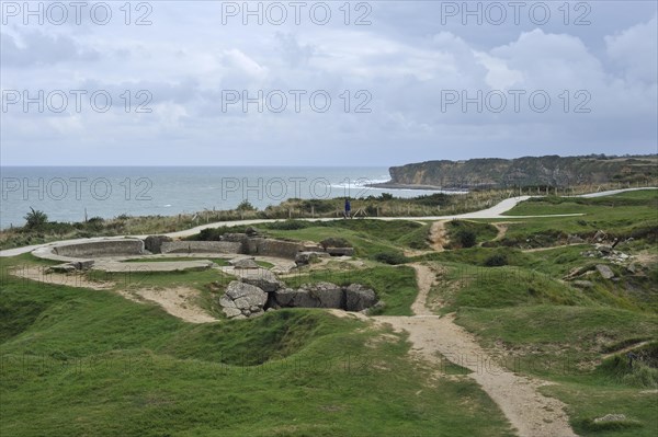 Second World War Two site with bombed WW2 bunkers at the Pointe du Hoc