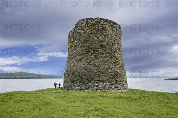 Elderly tourists visiting Mousa Broch