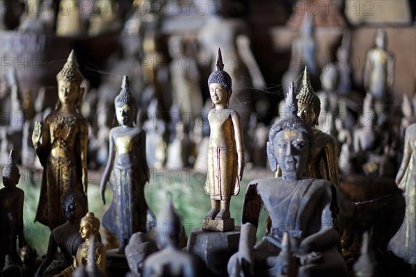 Buddha statues inside the lower cave