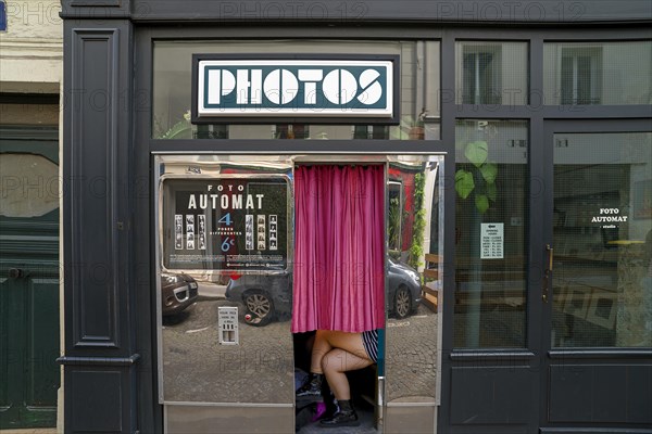 Photo booth in the facade of a photo shop Paris