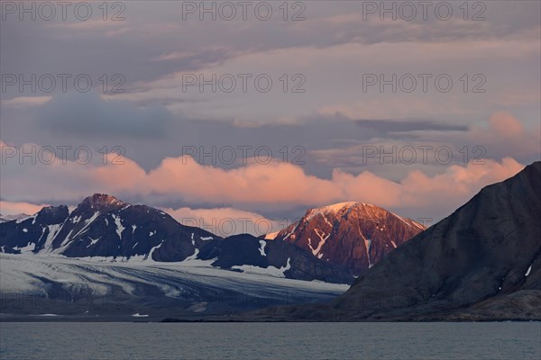 Mountains at sunset along the Hornsund fjord at Spitsbergen