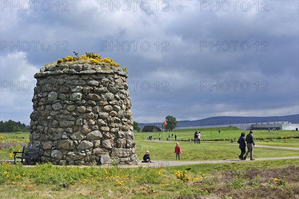 Tourists visiting the moor with its memorial cairn and visitor centre at the Culloden battlefield