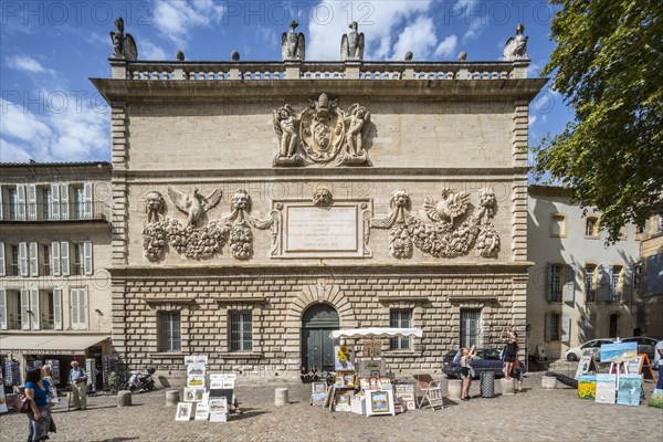 Paintings for sale in front of the Hotel des Monnaies