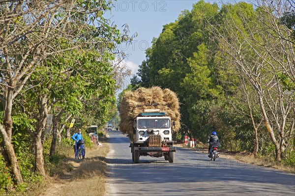 Heavily loaded truck transporting hay
