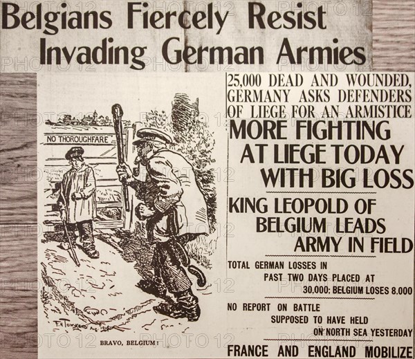 WWI newspaper article with cartoon in English paper reporting news about the First World War One front in Belgium