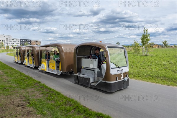 A SolarExpress rides with visitors at the Federal Horticultural Show