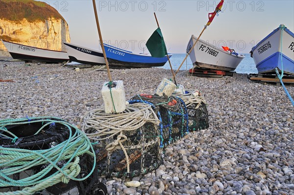 Lobster traps and colourful traditional caiques