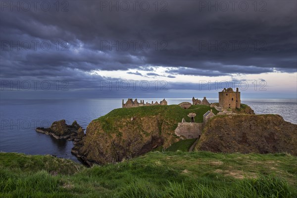 Menacing dark clouds above Dunnottar Castle