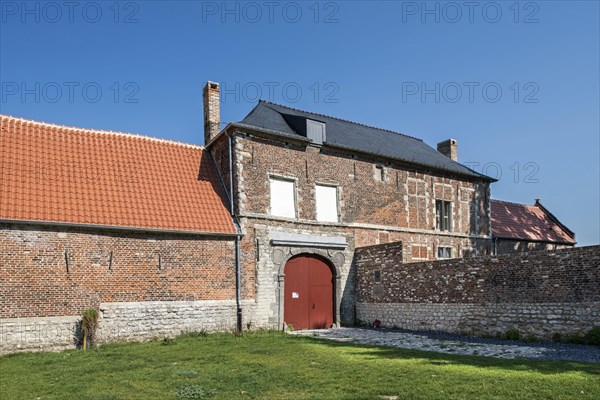 Entrance gate of the renovated Chateau d'Hougoumont