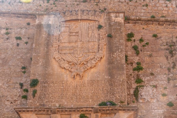 Shield at the entrance of the wall of the coastal city of Ibiza