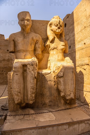 Beautiful interior with its columns in one of the most beautiful temples in Egypt. A young woman at Luxor Temple