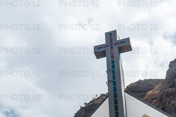 White Church Cross in the village of Paul do Mar in summer in eastern Madeira. Portugal