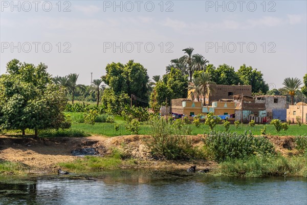 Egyptian local people living on the bank of the river Nile. Views sailing on the cruise on the river Nile from Luxor to Aswer