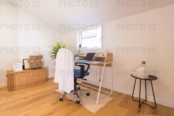 Interior space with no people with the office of a nutritionist doctor at home