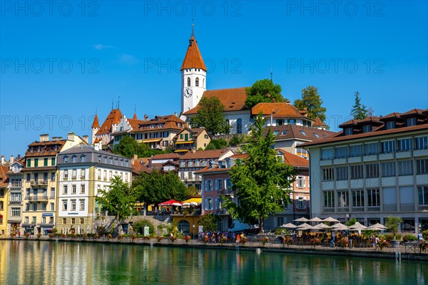 City of Thun and River Aare with Castle and Church in a Sunny Day in Thun