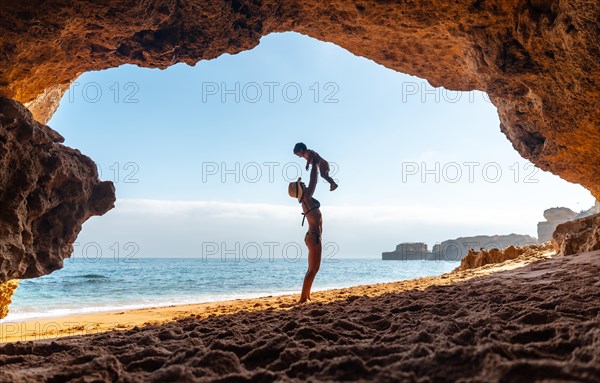 With the son in the natural beach cave in the Algarve at Praia da Coelha