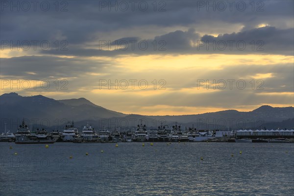 View from the Croisette in the evening of yachts during the Cannes Yachting Festival