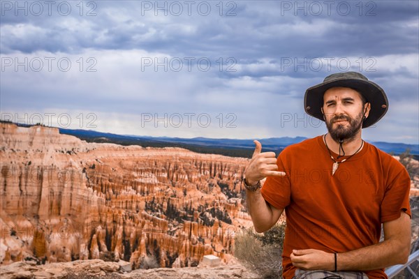 A young European man at the national park from Bryce Point in Bryce National Park
