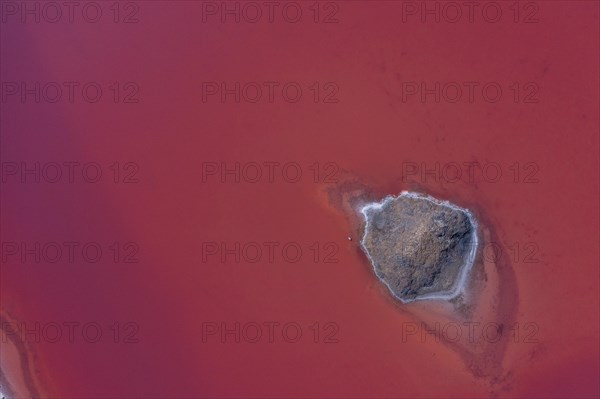 Aerial view of a salt works with salt island