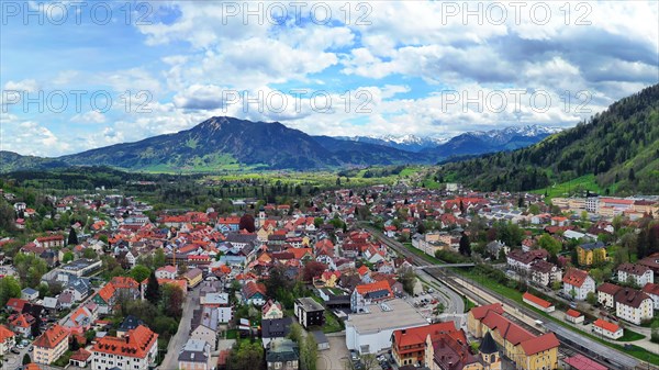 Aerial view of Immenstadt im Allgaeu with a view of the Alps. Immenstadt im Allgaeu