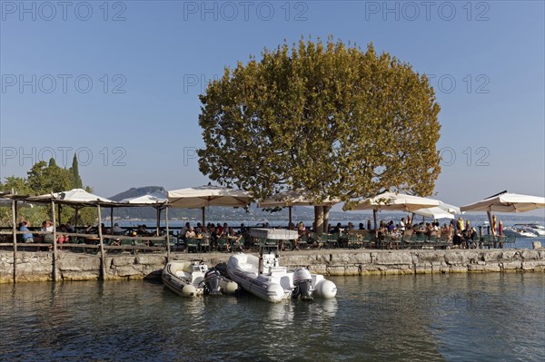 Idyllic harbour and pier on the lakeshore