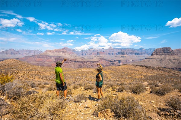 A european couple on the South Kaibab Trailhead trekking. Grand Canyon