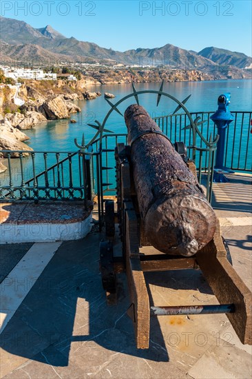 A canyon in the Balcon de Europa and Calahonda beach in the background of the town of Nerja