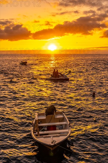 Sunset next to a staircase that goes down to the sea in the town of Poris de Candelaria on the north-west coast of the island of La Palma