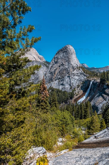 Panoramic of Vernal Falls from the winged top of a tree. California