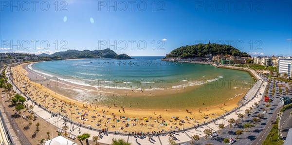 Panoramic view of the beautiful La Concha beach in the city of San Sebastian in summer