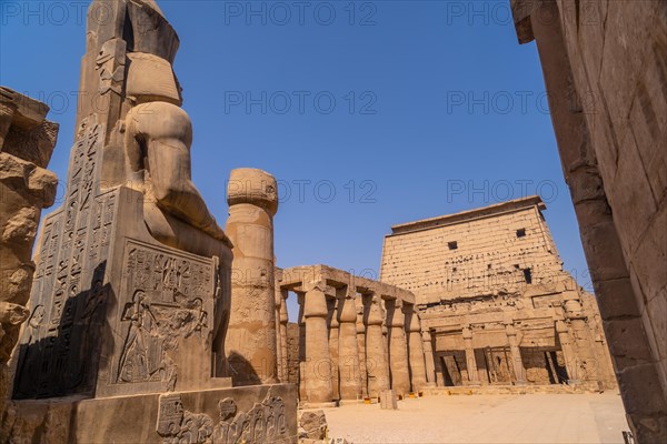 Sculptures of pharaohs in the Egyptian Temple of Luxor and its precious columns. Egypt