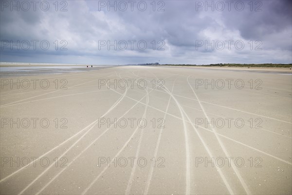 Traces of beach sailors in the sandy beach