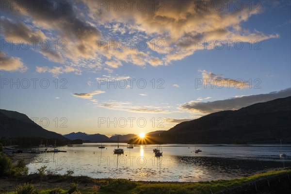 Sunset over the freshwater loch Loch Leven