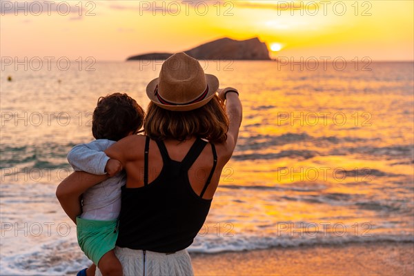 Tourist hat at sunset in Cala Comte beach on the island of Ibiza. Balearic