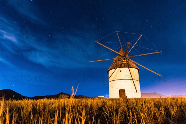 Molino del Pozo de los Frailes at night in the town of San Jose in Cabo de Gata