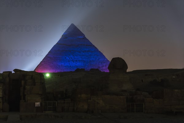 Sound and light show at the beautiful pyramids and sphinx of Giza. Night in the city of Cairo. Africa