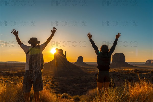 A lifestyle couple at dawn in Monument Valley