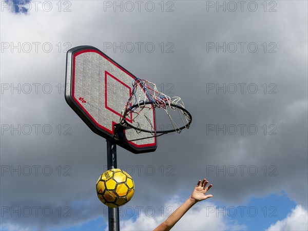 Basketball Jumping with the ball to the basket and net